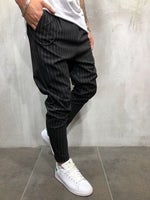 Stylish men's pants in a strip